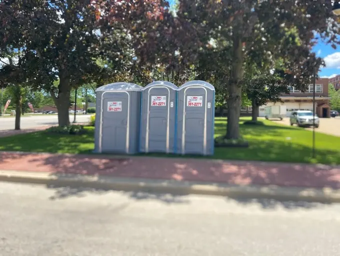 Standard portable toilets at a community space in Lake County, IL