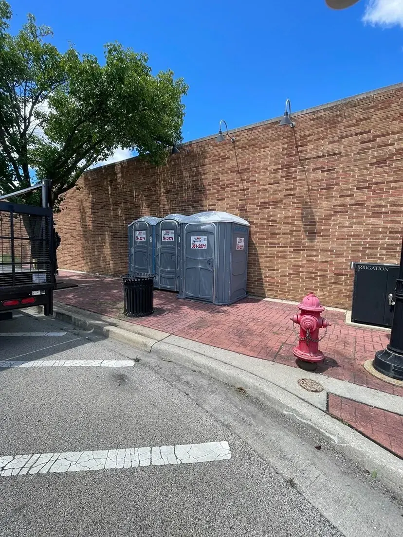 A row of clean standard units set up on a downtown street in Lake County
